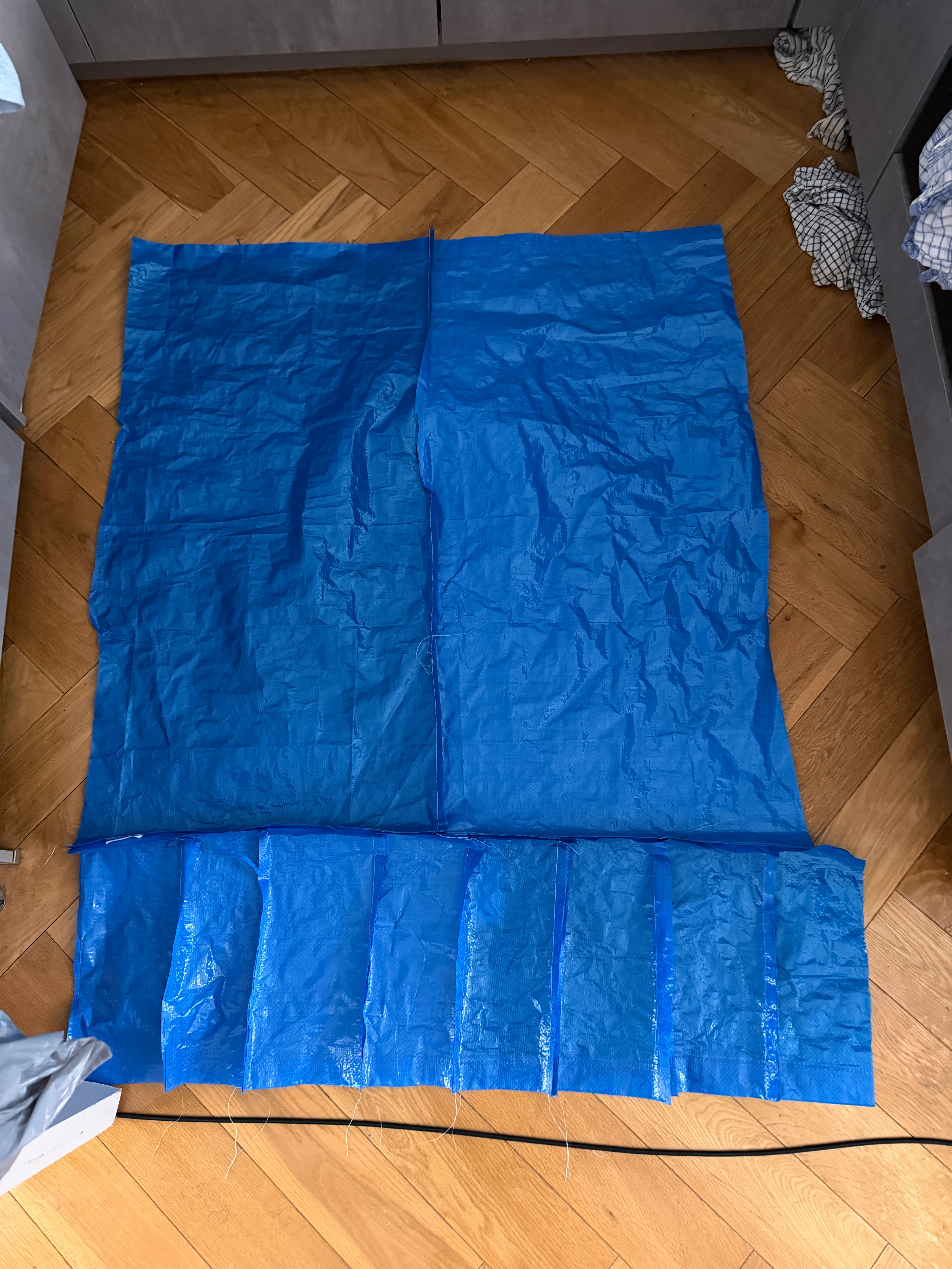ikea frakta bag assembled on the floor and sewn