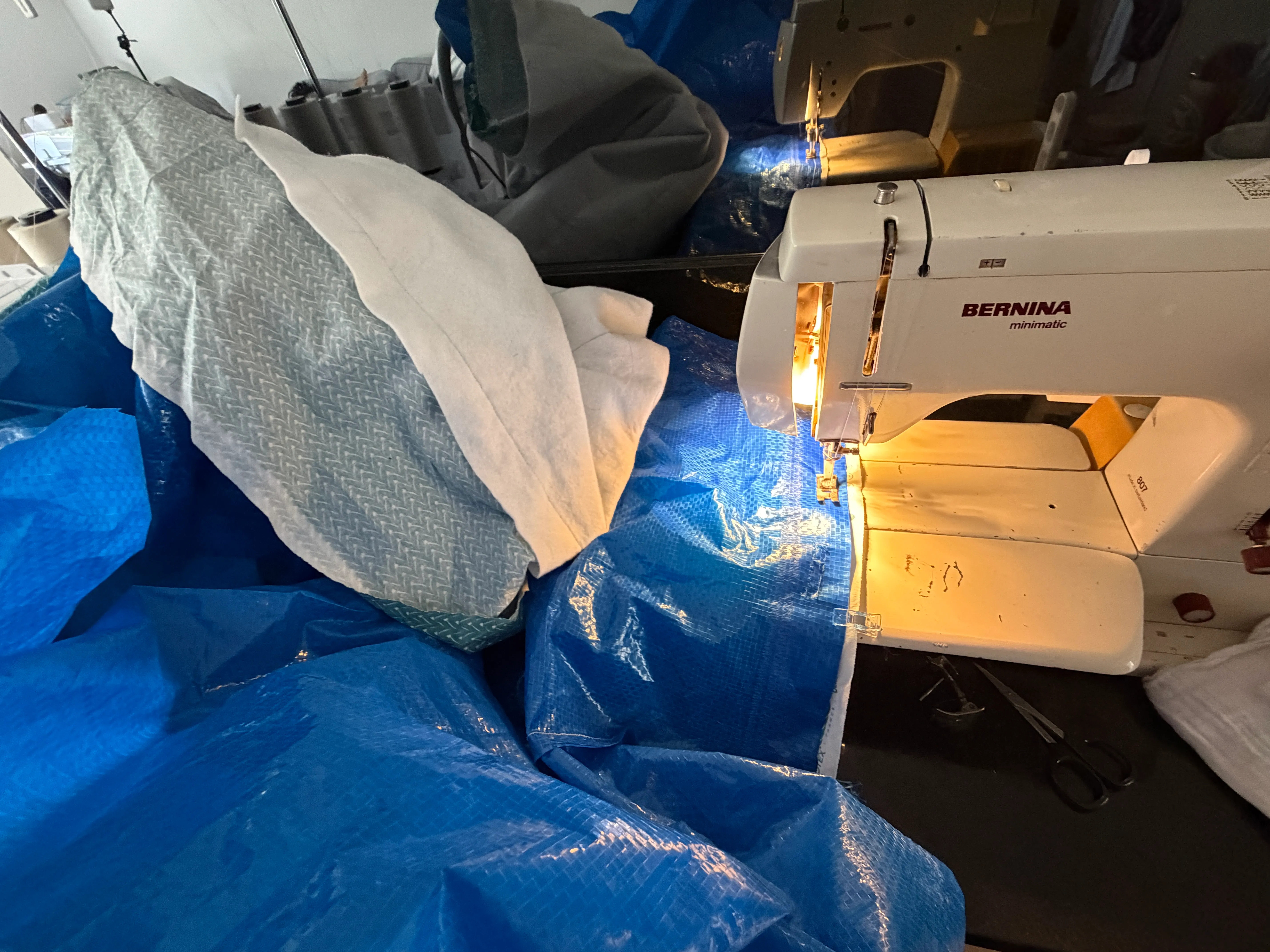 close up view of sewing the blanket together