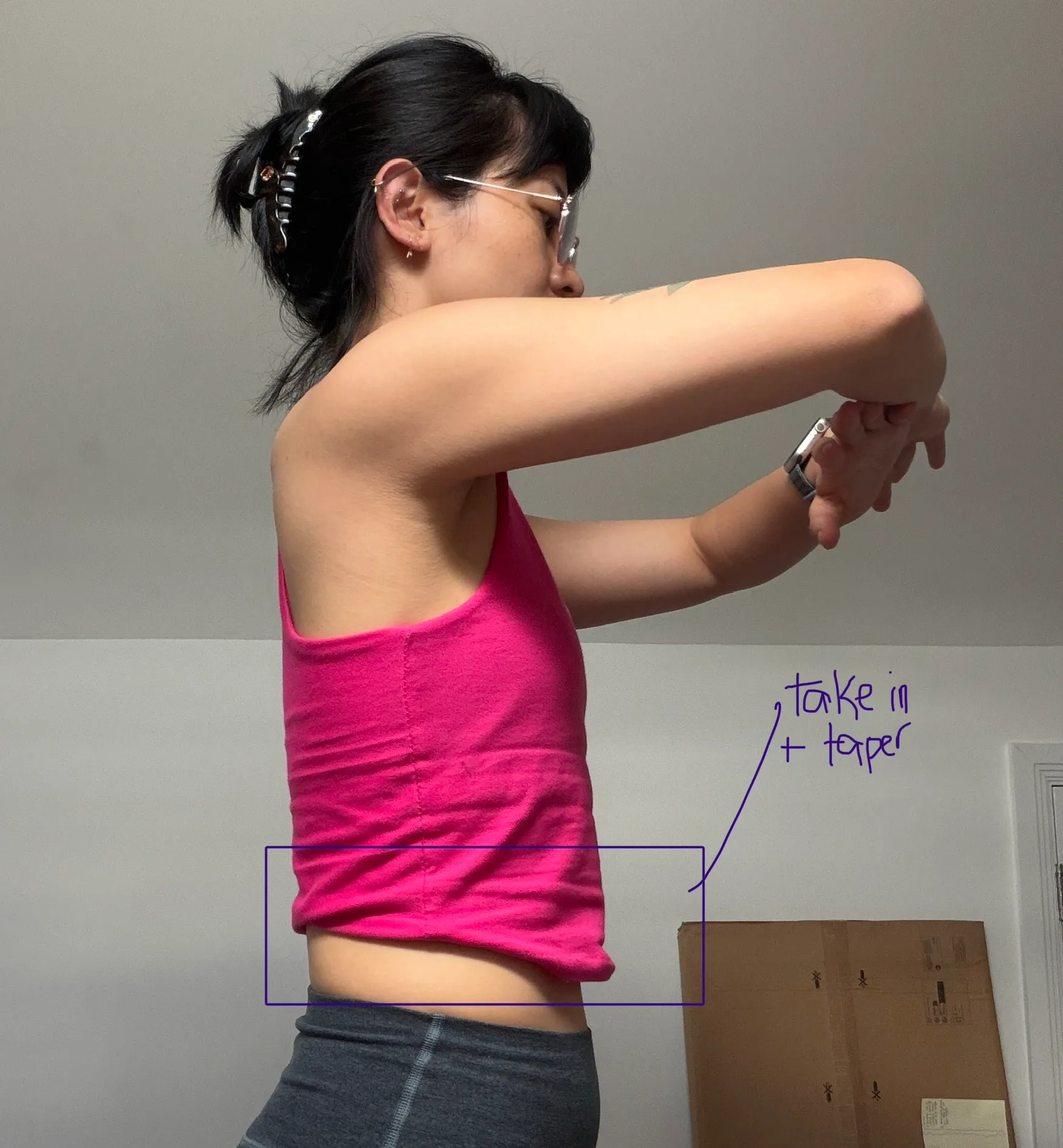 Side view of shirt with notes to take in and taper at the waist