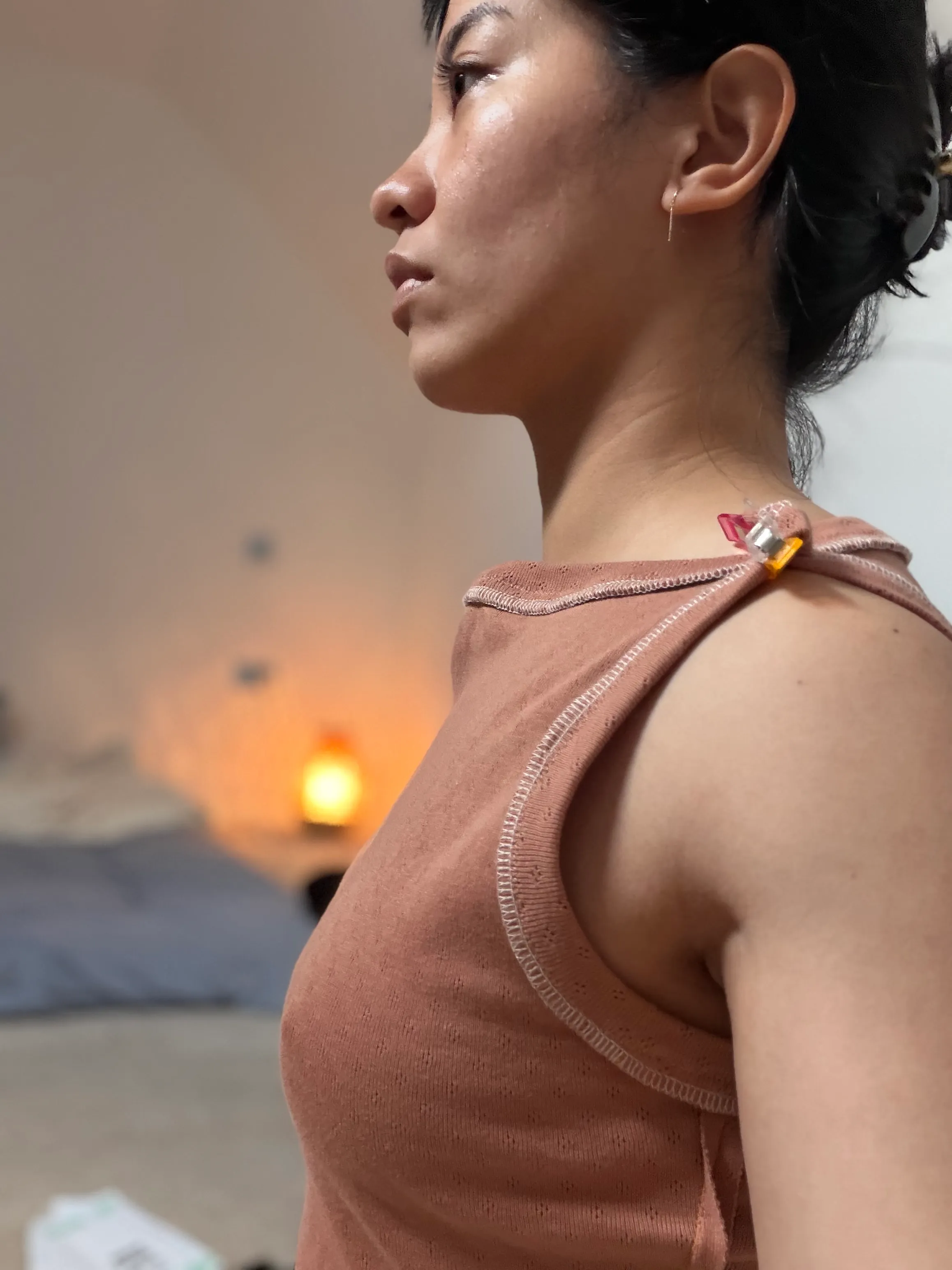 side view of v1 with wonderclips at shoulders