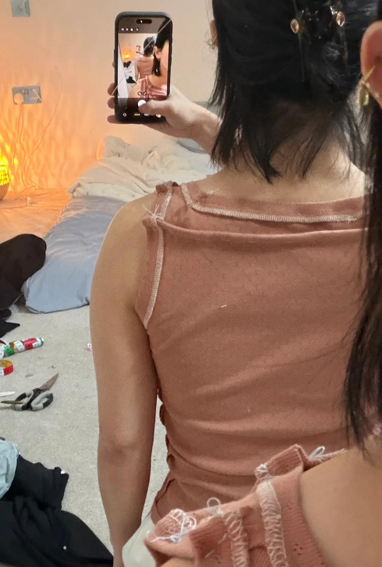 back view of horizontal tuck near shoulder