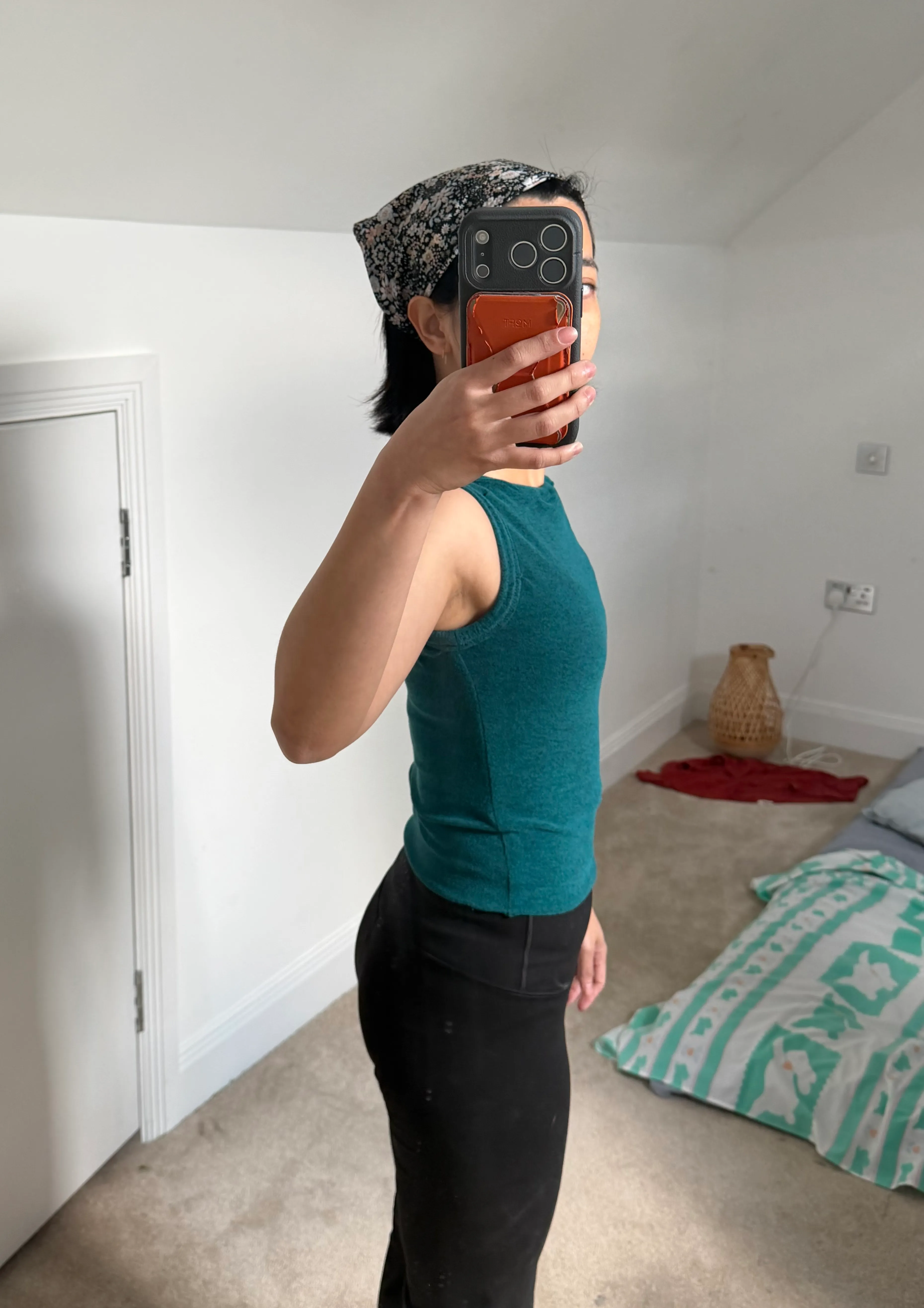 side view of petrol colored honeygirl boatneck