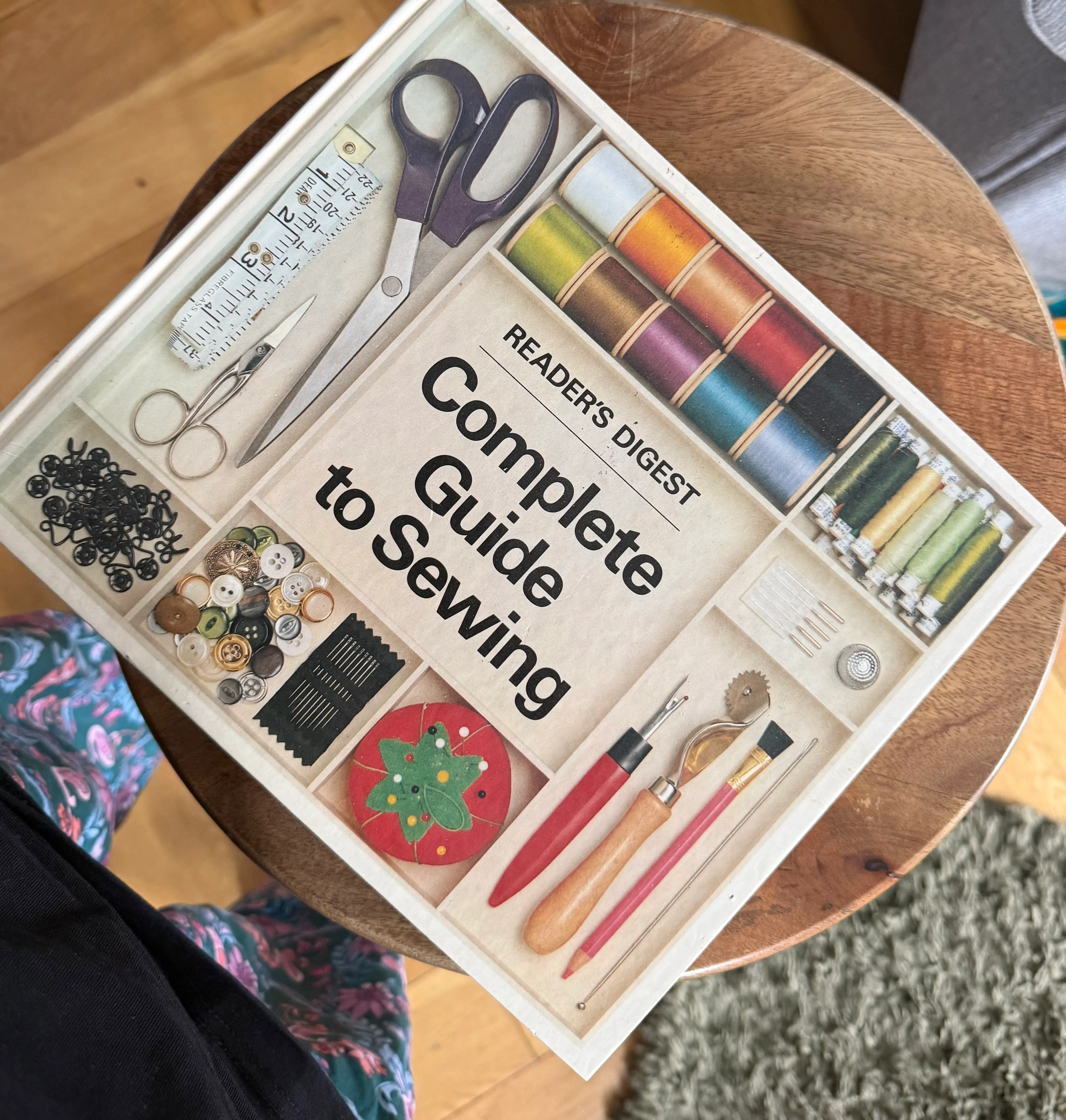 photo of Complete Guide to Sewing by Readers Digest on a stool