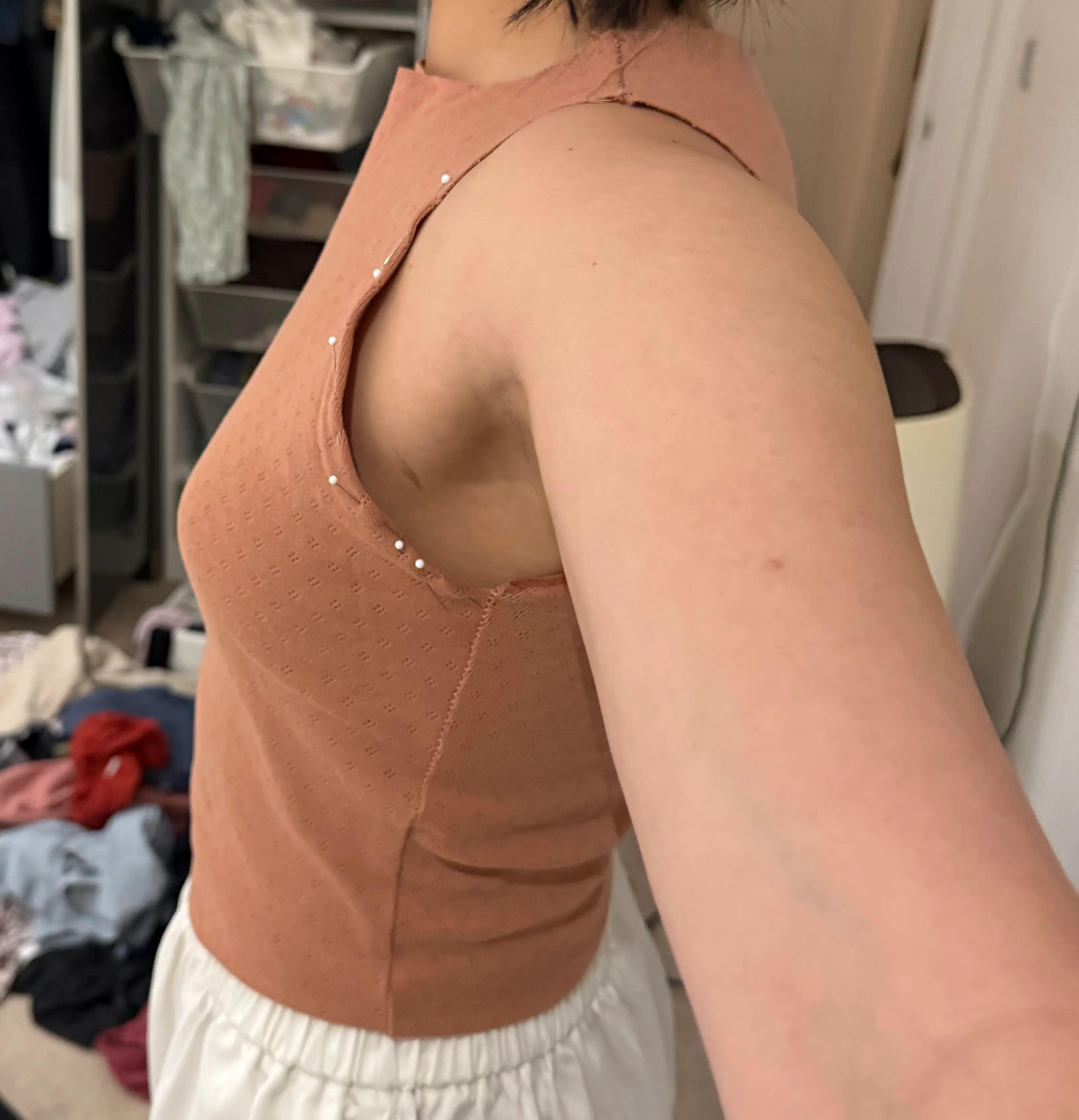 side view of armhole extension with arm up